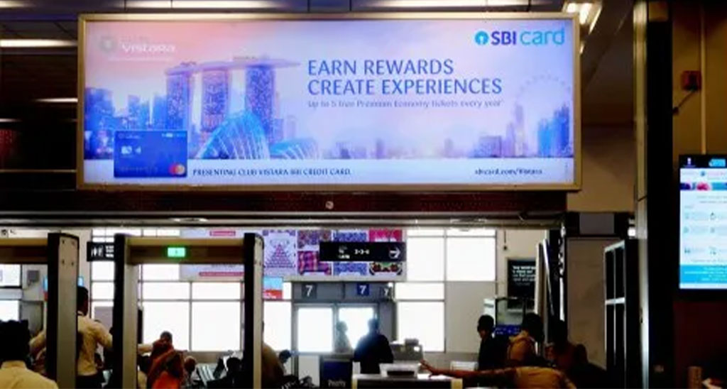 Illuminated advertising display inside an airport terminal